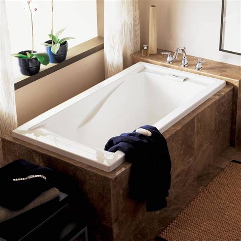 An inflatable bathtub lets you bathe baby on a counter or table. Evolution 60x32 inch Deep Soak Bathtub - American Standard ...