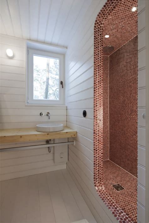 This bathroom from gretchenblack features a lovely penny tile floor with a floral pattern that's sweet and simple to replicate. Twinspired