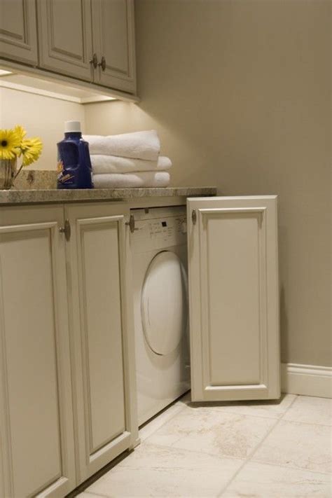 Whether this is a closet for your clothing, or more realistically, a place which you use as storage. Doors to hide washer and dryer | Laundry room design