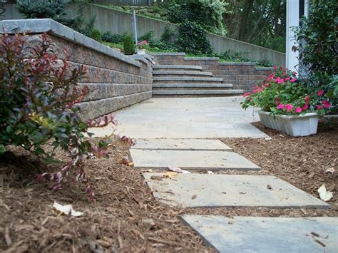 Not only that, you can turn it into a terraced garden for planting anything from vegetables and flowers. Unilock Stonehenge with Roman Pisa retaining wall and ...