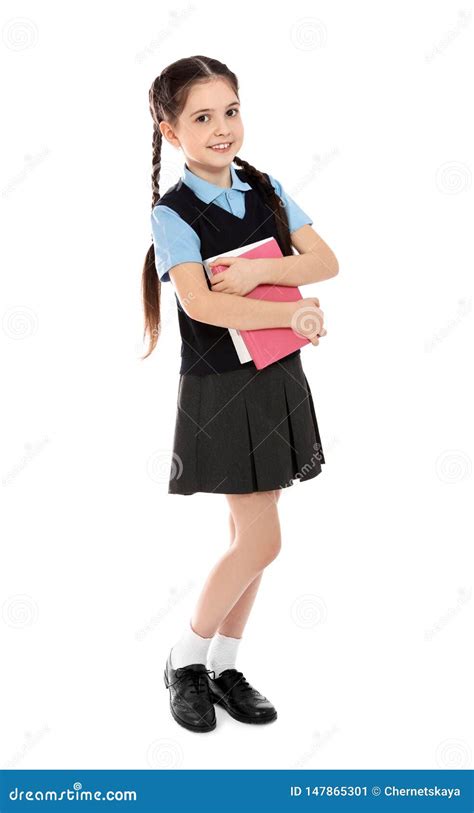 Full Length Portrait Of Cute Girl In School Uniform With Books Stock