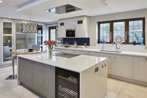 Classic white kitchen with circular oak breakfast bar ... You don't have to go large to get a hardworking breakfast bar.