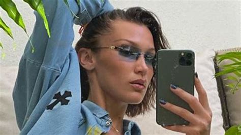 Bella Hadid Shows Off In Topless And Tropical Selfie On Instagram