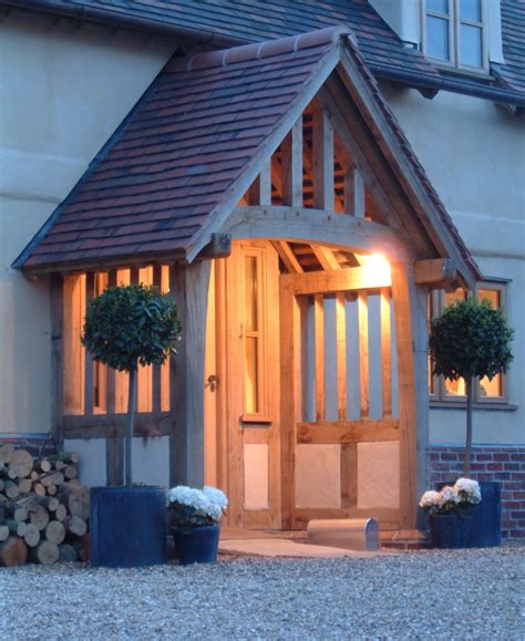 The most common thing on each porch is greenery, so. from little acorns.........: The Border Oak porch