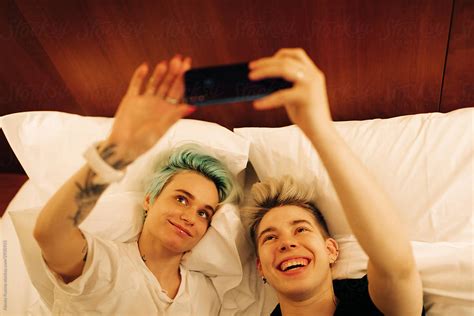 Lesbian Couple Making Selfie By Stocksy Contributor Alexey Kuzma Stocksy