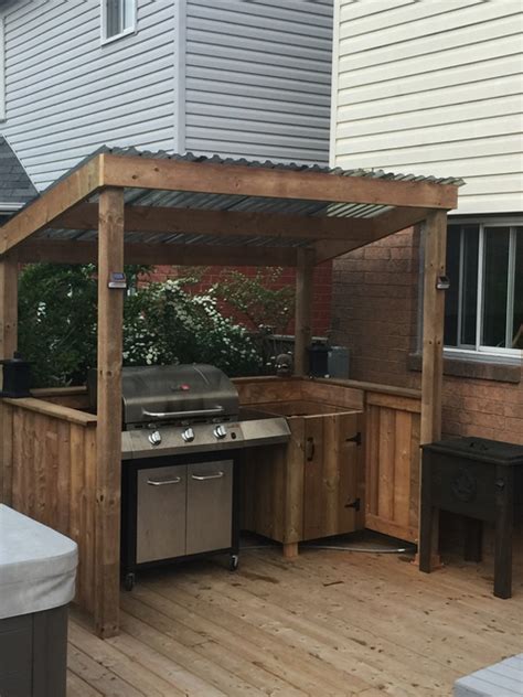 If you want to create a lean to shelter for your bbq grill, using common materials and tools, you should take a look over this project. BBQ Shelter | Review of Schmidtke Kitchen/Bath | HomeStars | Outdoor bbq kitchen, Outdoor grill ...
