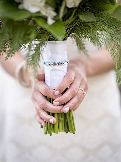 Special Bracelet Wrapped Around Bouquet At Winter Wedding Wonderland In