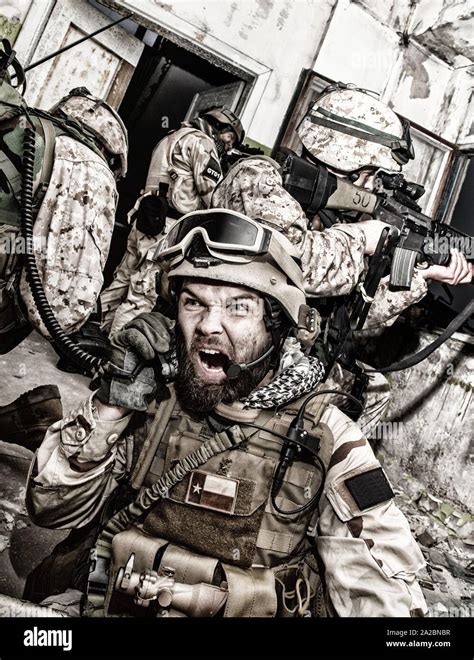 Special Forces Team Leader Screaming In Tactical Radio Handset While