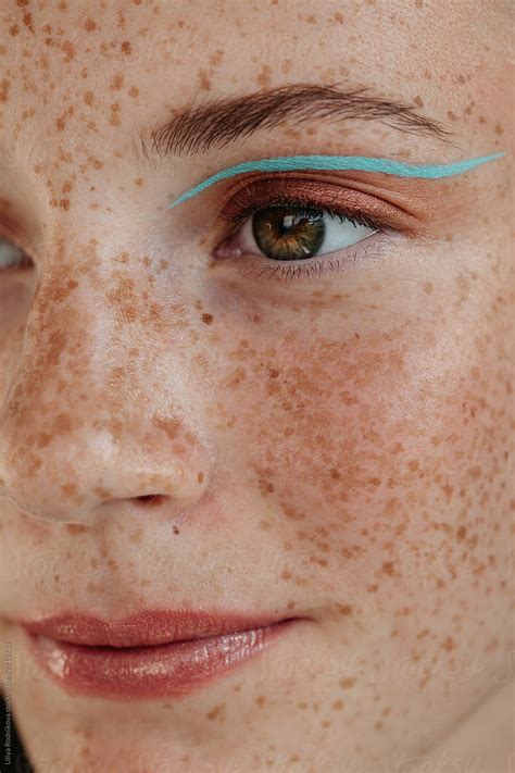 Face Of Young Freckled Woman With Makeup By Liliya Rodnikova