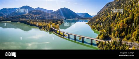 Scenic Aerial View Of The Bridge Over Lake Sylvenstein With Beautiful