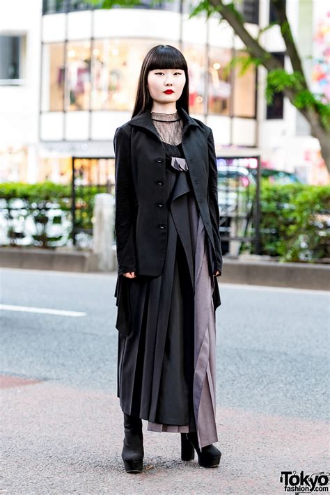 monochrome minimalist street style w yohji yamamoto coat yohji pleated dress and suede platform