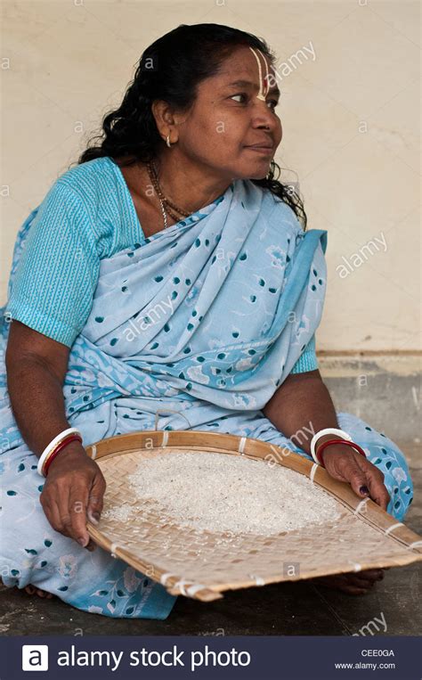 Woman Sifting Rice Hi Res Stock Photography And Images Alamy