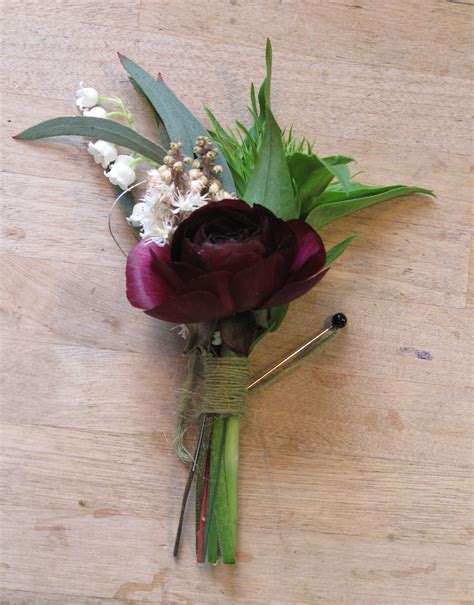 Bout With Dark Purple Ranunculus And Other May Flowers