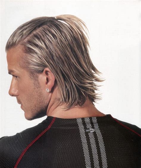 Still sporting the undercut, but with a beard it looks even more. David Beckham Hairstyles - Star Hairstyles