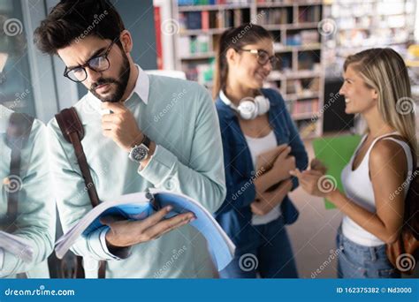 Happy Young University Students Studying Together Group Of Multiracial