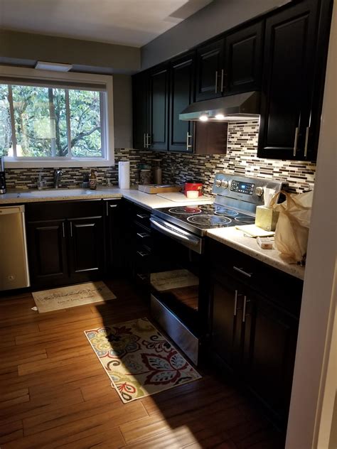 Diamond now at lowe s denver collection denver s knots and varied grain pattern brings a sense of th rustic kitchen hickory kitchen cabinets kitchen remodel. Top 10 Reviews of Lowe's Kitchen Cabinets