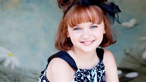 Blue Eyes Smiley Cute Little Girl Is Wearing White Blue