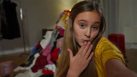 Selfie Pov Of Cute Teen Girl Filming Video Blog Gesturing Peace Looking At Camera Stock Footage