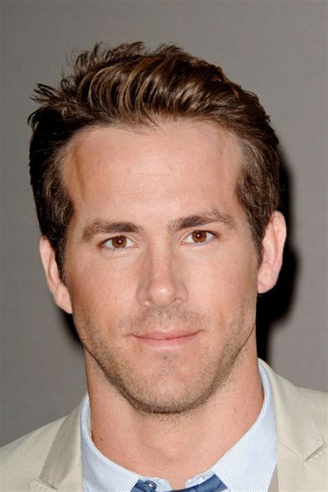 Behold Ryan Reynolds Sporting A Suave Side Part Hairstyle Gazing