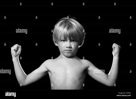 Little Boy Showing Muscle Hi Res Stock Photography And Images Alamy