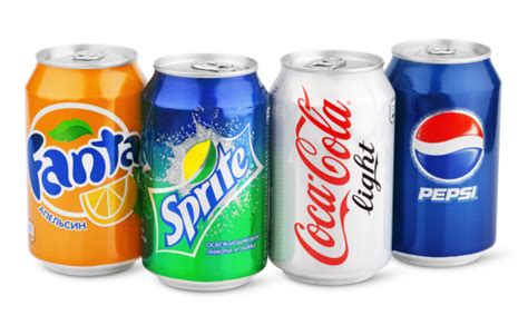 Group Of Various Soda Drinks In Aluminum Cans On White Stock Photo