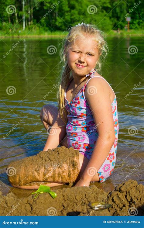 Beautiful Preteen Girl In Swimsuit Creating Castles From Wet Sand On Sexiezpicz Web Porn