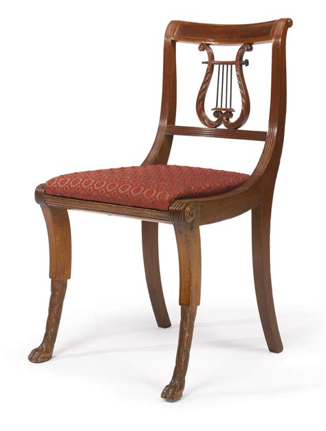 211 A Classical Carved And Figured Mahogany Lyre Back Klismos Side Chair Attributed To The