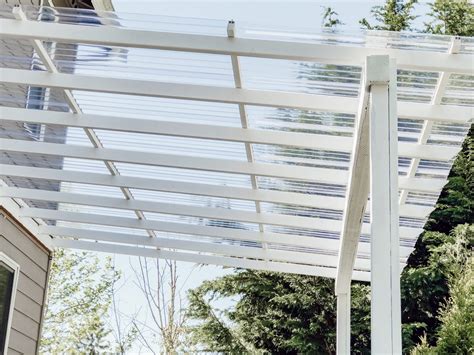 Diy Clear Corrugated Covered Pergola Attached To The House And An