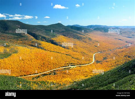 Highway And Autumn Foliage Mountain Top View In White Mountain New
