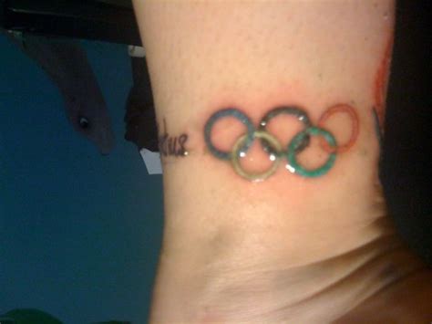 Our website provides the visitors with some great amazing olympic rings tattoo. Olympic Rings #ArmbarNation See more at RondaRousey.net ...