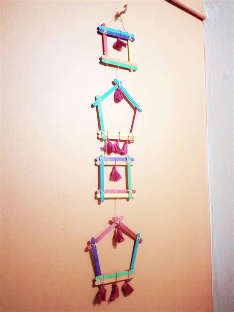 Wall Hanging Made Using Popsicle Sticks Popsicle Crafts Crafts Diy