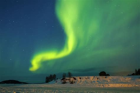 Aurora Above Frozen Lake Inari Finland Photograph By Adam Rainoff