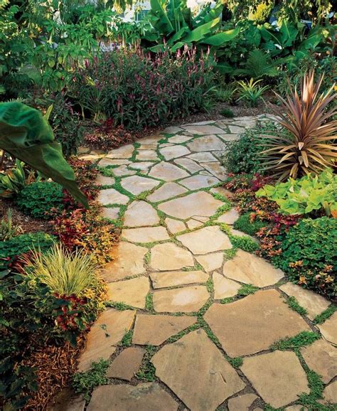 Installing A Flagstone Path Diy Garden Garden Paths Garden Projects