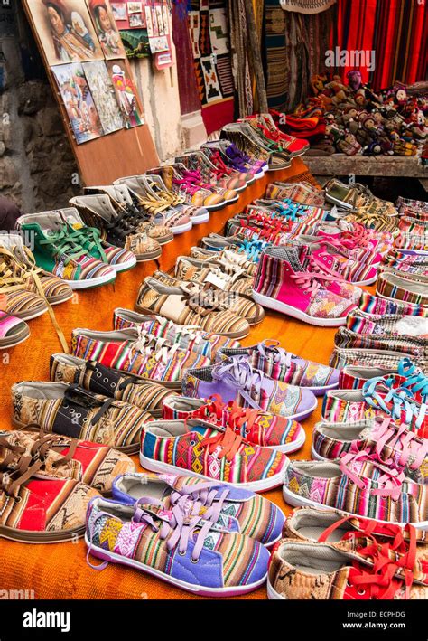 Brightly Coloured Shoes On Sale In Pisac Market Peru Stock Photo Alamy
