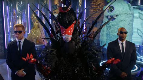 Fans Think They Know Who Black Swan Is On The Masked Singer