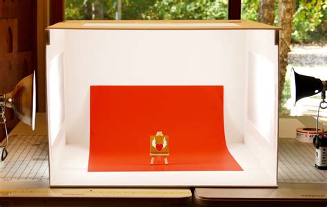 Cutting out the cardboard box. DIY Lightbox for Expert Photos that Wow! Step-by-Step ...