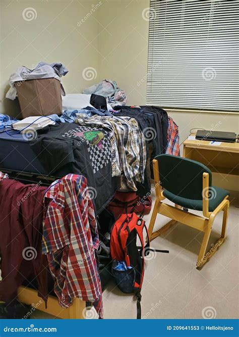 Messy Dorm Room Covered In Laundry Editorial Stock Photo Image Of