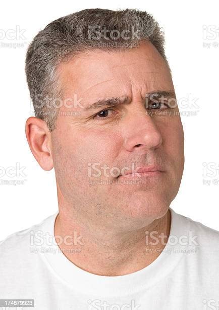 Uncertain Frowning Man Close Up Headshot Portrait Stock Photo