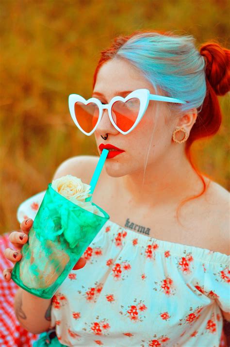 Woman Sipping Straw · Free Stock Photo