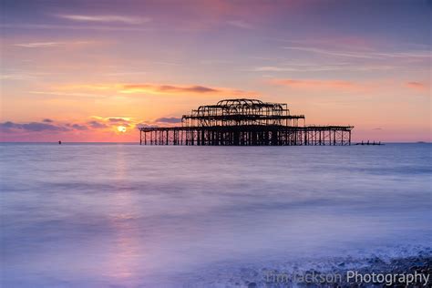 Sunset Over Remains Of Old Brighton Pier Tim Jackson Photography