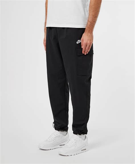 Nike Cotton Players Woven Cargo Track Pants In Black For Men Lyst