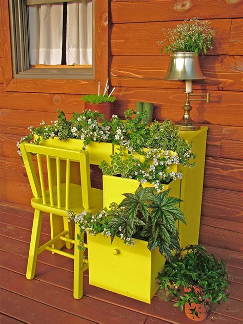An assortment of potted plants is displayed along with various trinkets and. 39 Best Creative Garden Container Ideas and Designs for 2017