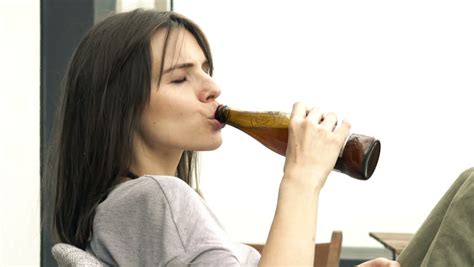 Young Attractive Woman Drinking Beer Outdoors Stock Footage Video
