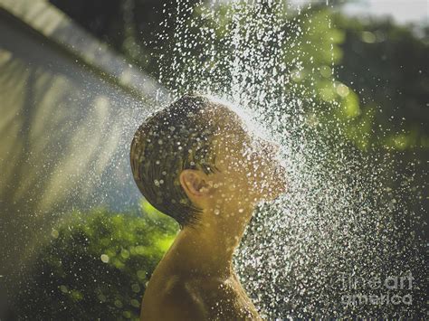 Photo Of Young Woman Enjoying Shower Photograph By Nadya Korobkova