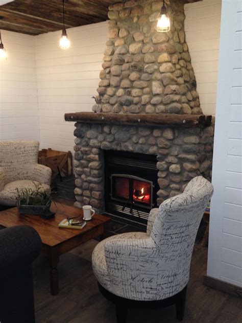 fieldstone fireplace at waters edge eco lodge sk canada