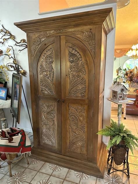 Richly Carved Mexican Pine Armoire Apr 15 2023 Burchard Galleries
