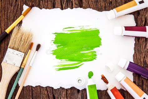 Art Brush And Green Watercolor Painted With White Paper Art On Stock