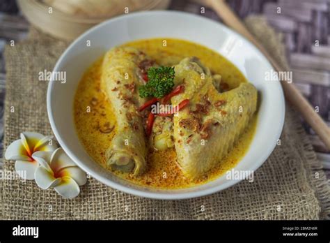 Opor Ayam Indonesian Curry Chicken Cooked In Coconut Milk And Spices