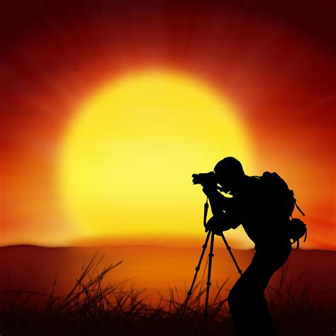 Silhouette Of Photographer With Big Sun Photograph by Setsiri Silapasuwanchai | Fine Art America