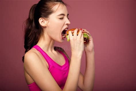 Hungry Girl Eating Cheeseburger Stock Image Image Of Holding Junk 166832525